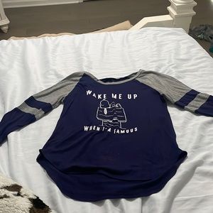 A blue and grey tee shirt